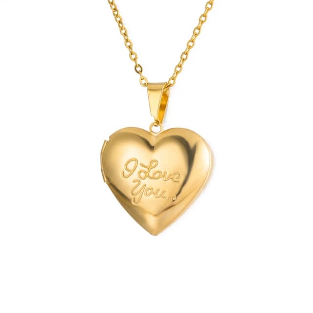 A gold heart locket engraved with the words I love you.
