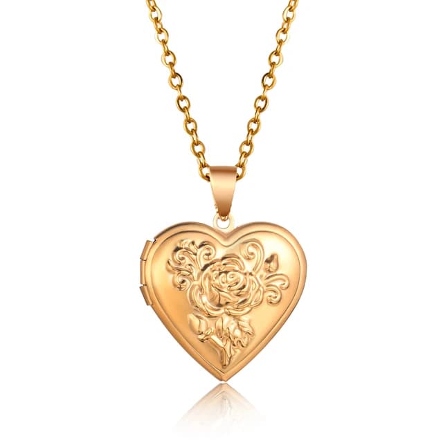 A gold heart locket engraved with a rose.