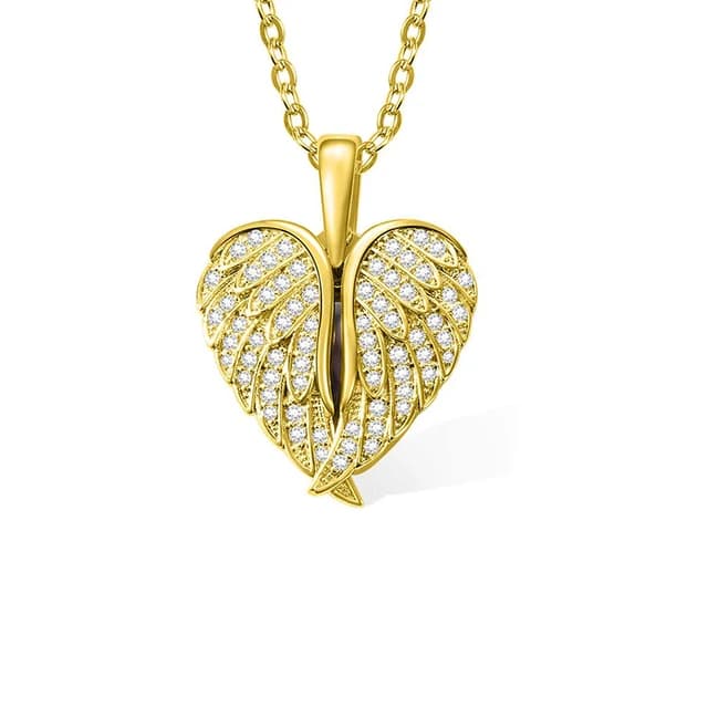 A gold heart locket framed by angel wings.